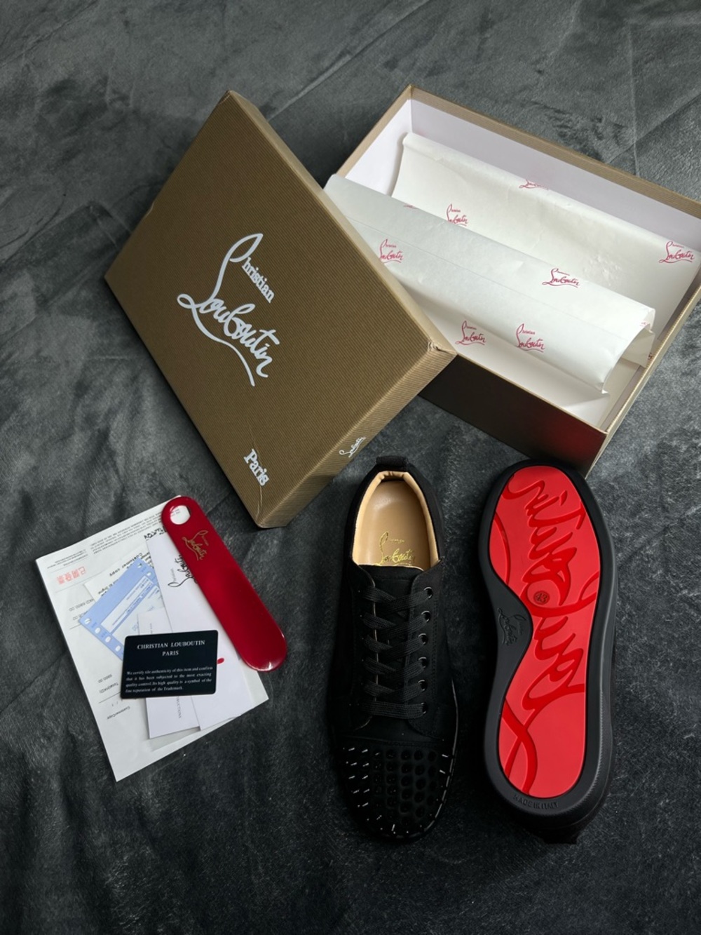 Christian Louboutin Men’s Black Studded Low-Top Sneakers with Red Sole